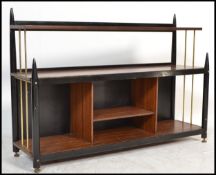 A vintage mid 20th Century Tola wood and ebonised shelving system in the manner of G-Plan Librenza