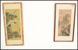 A pair of early 20th century Japanese watercolour paintings on silk being framed and glazed. Both