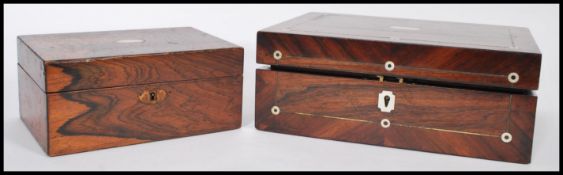 A 19th century Georgian mahogany writing slope, having a blue velour interior, panelled top with