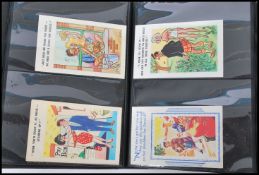 An album of vintage Comic postcards dating from the early 20th century to include Bamforths and