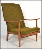 A  vintage mid century teak wood open armchair of Danish influence being upholstered in the original