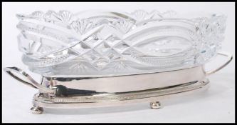 A vintage 20th century WMF silver plated and cut glass centerpiece bowl. The silver plate stand