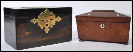 Two 19th century tea caddies one being a coromandel wood example with large armorial brass mounts.
