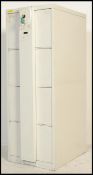A 20th century Industrial white painted metal pedestal filing cabinet having upright body of 4