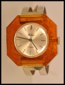 A vintage retro 1970's Belair ladies watch with a round face and stick batons to the chapter ring,