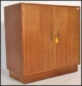 A stunning vintage 20th Century science lab wooden cabinet, fitted with a double full length doors