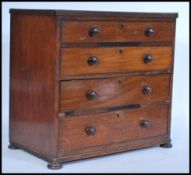 A 19th century apprentice piece / specimen cabinet chest of drawers. Raised on bun feet with a