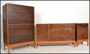A vintage mid 20th Century three piece bedroom suite, consisting of a tall straight chest of drawers