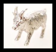 A sterling silver figurine in the form of a goat. Weight 13.5.