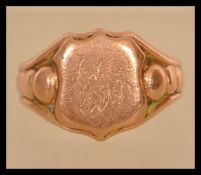 An 20th hallmark 9ct signet gentlemans gold ring. Hallmark Chester '' N '' 375 makers initials J H