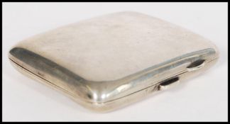 A silver hallmarked cigarette case along with a boxed pair of silver hallmarked Victorian napkin