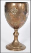 A vintage 20th century silver hallmarked goblet wine cup raised on stepped circular base. Applied