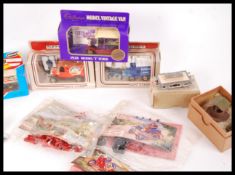 ASSORTED SCALE DIECAST MODEL VEHICLES AND CONSTRUCTION KITS