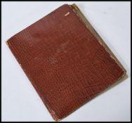 A vintage 20th century cigarette card album containing Carreras Tools, Wills, Players, Kodak at