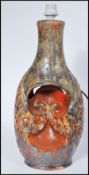 A large 20th century Cornish studio pottery lamp of Fat Lava inspiration. Of bottle baluster form