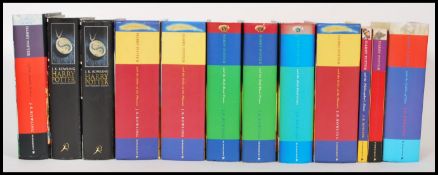 A selection of hard backed and paper backed Harry Potter books by J.K. Rowling to include 'Harry
