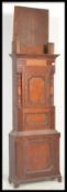 A 19th century mahogany clock body with a panelled door and moulded detailing. Measures: 218cm