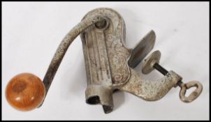 A vintage early 20th century Hektor 2 bar mounted corkscrew having wooden knob handle. Measures