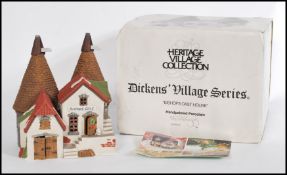 A 20th century collectors  Heritage Village Collection ‘ Village Dickens Series ’ ceramic house /
