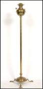 A 19th century Victorian Young's Central Draught standard oil lamp of brass construction. The