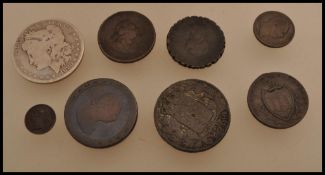 A collection of 19th and 18th Century coins to include an 1791 Edinburgh half penny, two 1799 George