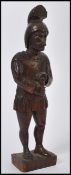 A 20th Century carved oak figure sculpture  modelled in the  form of a knight, the knight in full
