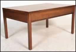 A vintage 20th Century teak wood coffee table by Meredew Associates's, the table fitted with a