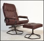 A 1970's retro swivel armchair in the manner of Dux. The chair and stool with ebonised tubular