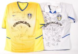 LEEDS FOOTBALL CLUB - PAIR OF HOME & AWAY AUTOGRAPHED SHIRTS