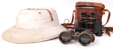 20TH CENTURY PITH UNIFORM HELMET WITH TWO SETS OF