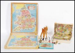 A collection of vintage and retro toys to include a Steiff Bambi stuffed toy, a Victory wooden
