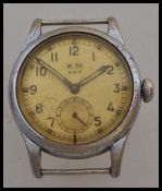 A vintage 20th century WW2 Second World War KM Kriegsmarine watch. Steel case with stamped serial
