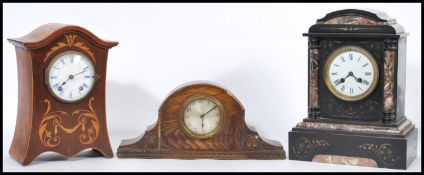 A group of three vintage mantel clock comprising of a mahogany Edwardian boxwood inlaid clock, black