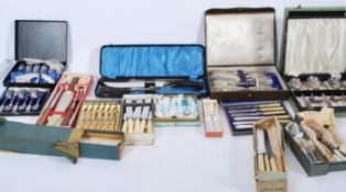 A large selection of vintage boxed flatware to include some silver plate examples, stainless