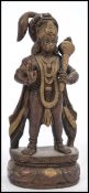 A 20th century bronze figurine of the Monkey God Hanuman raised on pedestal base. 23cm high 10cm