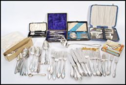 A collection of vintage flatware to include a cased set of 800 silver spoons, various German