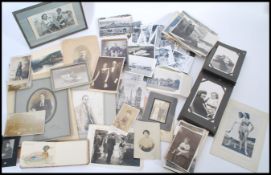 A collection of postcards and photographs dating from the early 20th century to include various