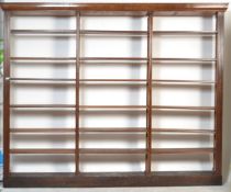 A good large 19th Century Victorian oak triple section library bookcase cabinet of open window form.