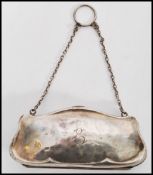 An early 20th century hallmarked silver ladies purse being hallmarked for Birmingham 1915. Makers