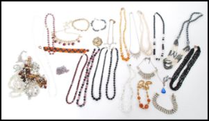 A selection of vintage costume jewellery to includ