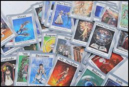 A set of vintage 20th century Tarot cards, in an embroidered fabric pouch.