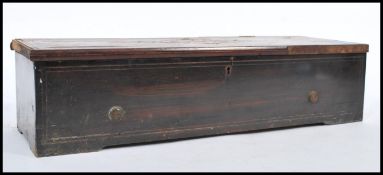A 19th century Georgian rosewood and marquetry inlaid cylinder music box of rectangular form