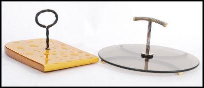 A vintage Art Deco inspired chrome and glass table cake stand / centre piece together with a retro