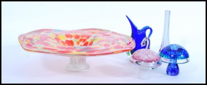 A selection of studio / art glass to include a red and yellow speckled glass centerpiece bowl,