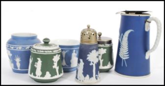 A group of 19th century Jasperware Cameoware in the manner of Wedgwood mostly Austrian with some