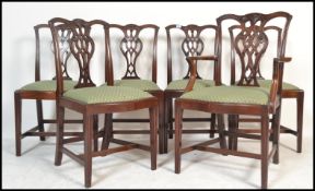 A set of 6 early 19th century George III Chippendale revival mahogany dining chairs. Raised on