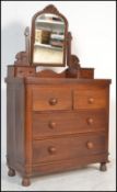 A Victorian mahogany dressing chest of drawers. Raised on a plinth base with a series of short and