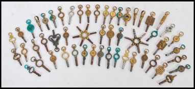 A collection of various vintage pocket watch keys to include HS Samuel, multi keys, Russells, silver