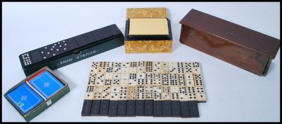 A group of vintage gaming items to include a woode