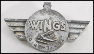 A vintage 20th century advertising car motoring related cigar ashtray for Wings cigarellos of